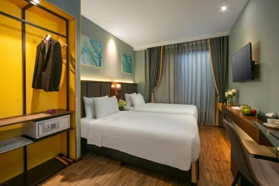 Camera doppia con letti singoli Deluxe — GRAND CITITEL Hanoi Hotel & Spa